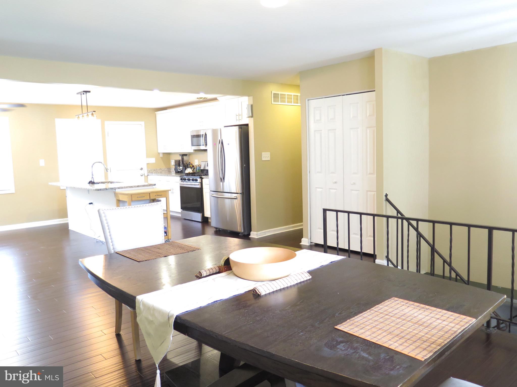 3939 Nemo Road Randallstown, MD 21133 - Photo 9 of 31 a view of a dining room with furniture window and wooden floor