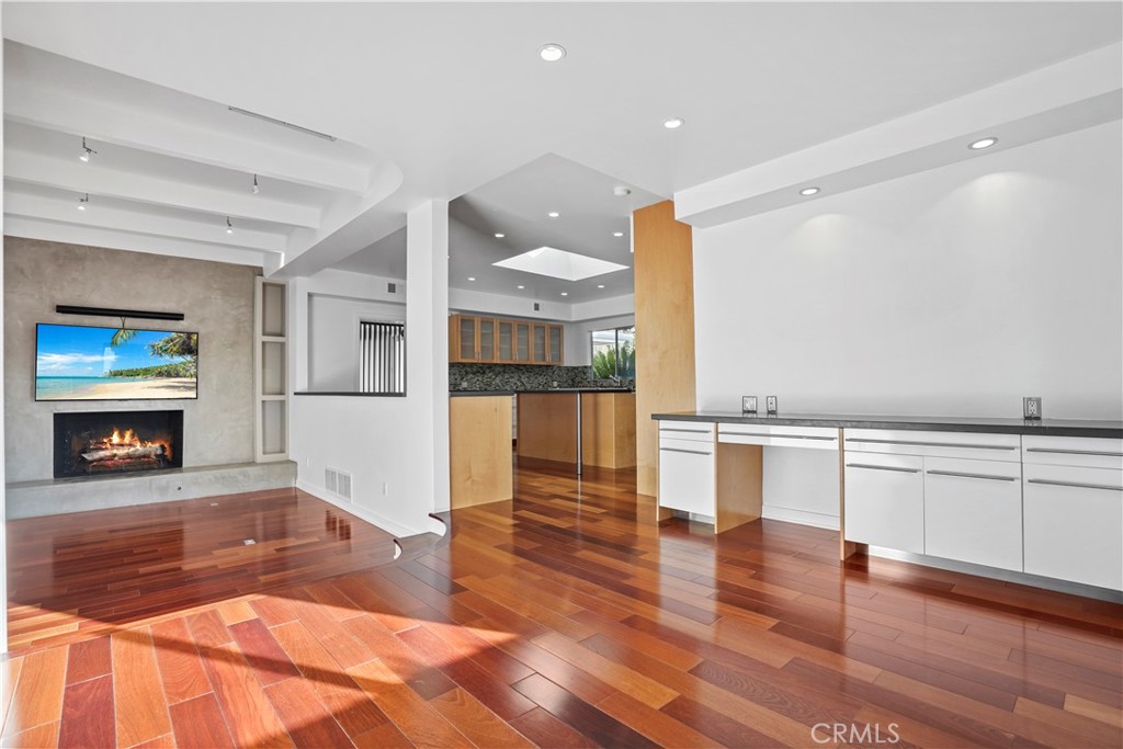16301 Meadow Ridge Road West Encino, CA 91436 - Photo 13 of 33 a view of a living room a fireplace and entryway
