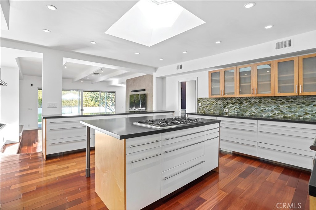 16301 Meadow Ridge Road West Encino, CA 91436 - Photo 4 of 33 a kitchen with stainless steel appliances granite countertop a stove and a sink