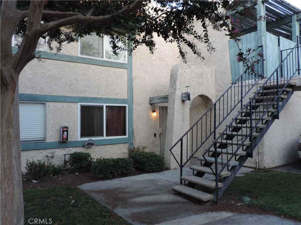 1322 Wheaton Way Riverside, CA 92507 - Photo 1 of 1 front view of a house with a yard