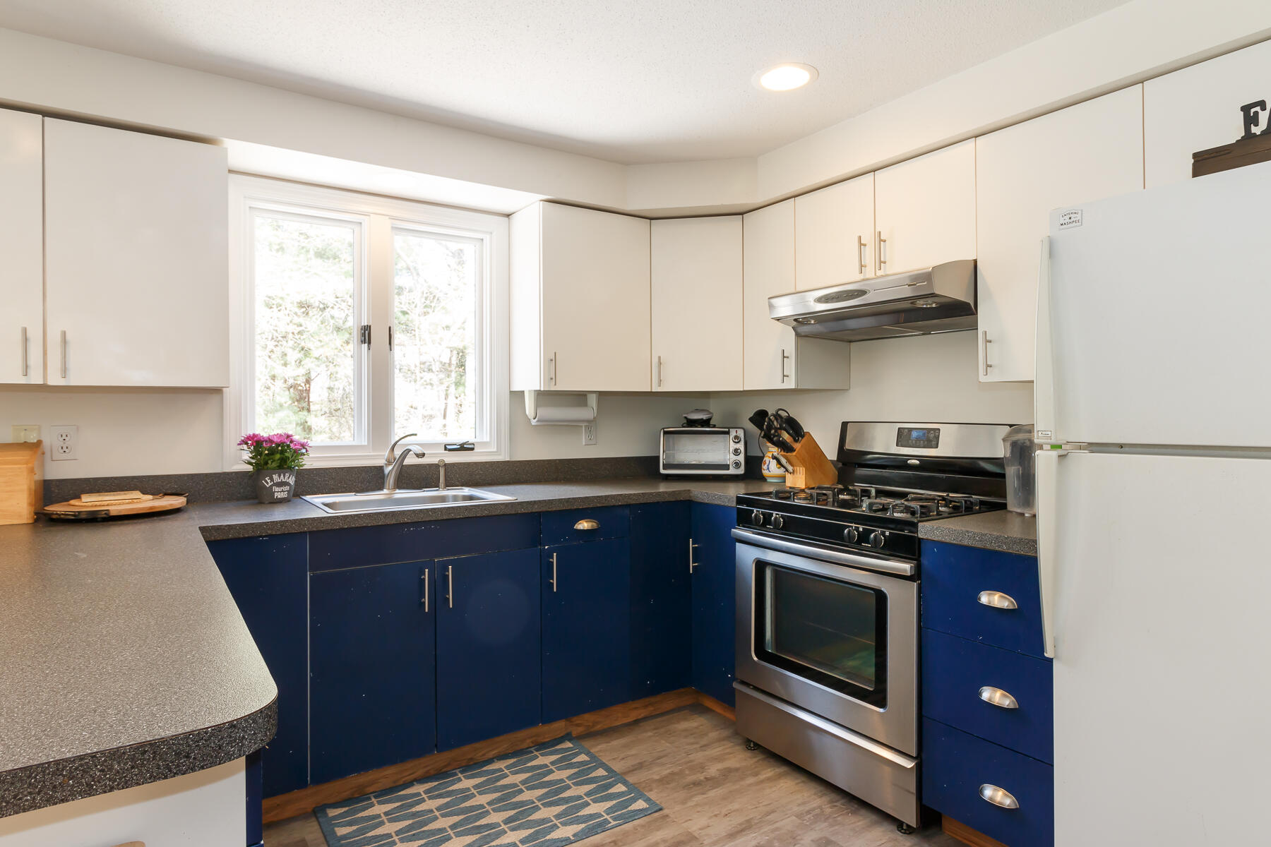 24 Green Meadow Circle Mashpee, MA 02649 - Photo 19 of 51 a kitchen with stainless steel appliances a stove a sink and a refrigerator