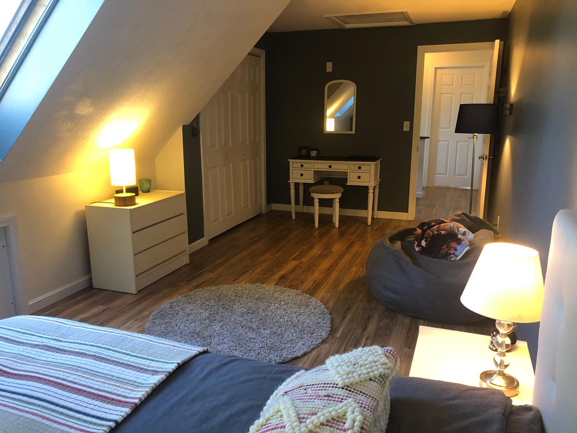 24 Green Meadow Circle Mashpee, MA 02649 - Photo 40 of 51 a living room with furniture and a wooden floor