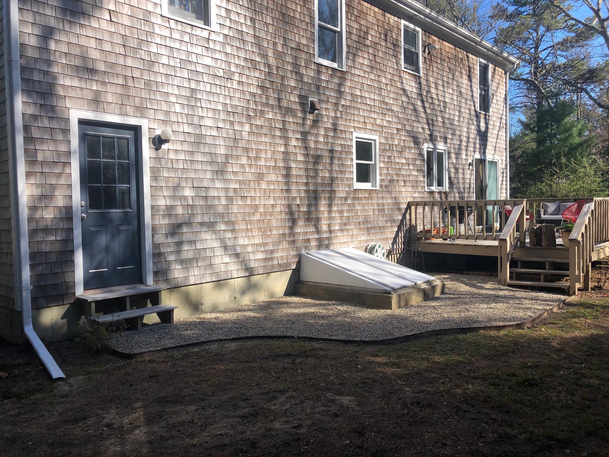 24 Green Meadow Circle Mashpee, MA 02649 - Photo 42 of 51 a view of a house with backyard and sitting area