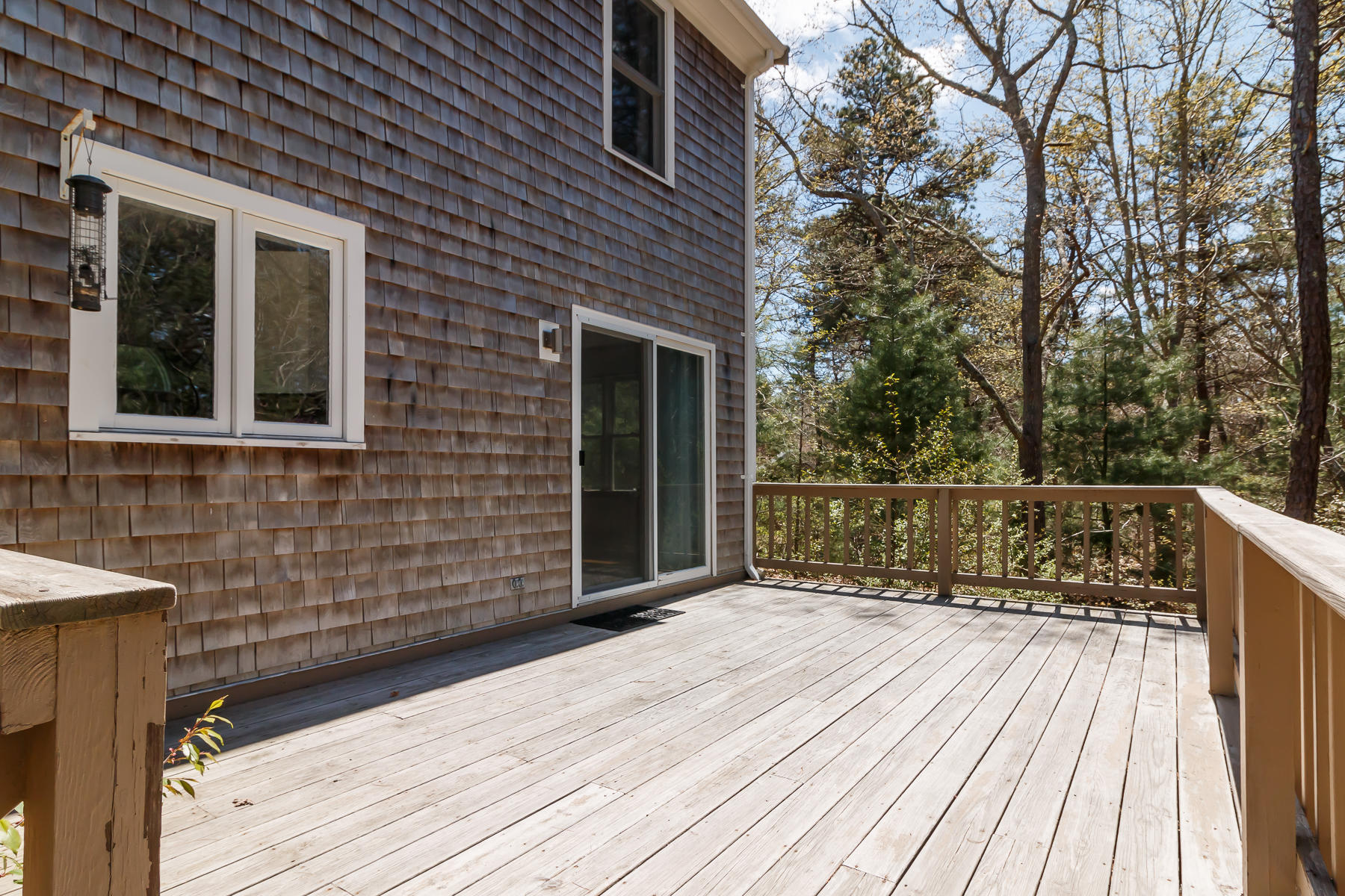 24 Green Meadow Circle Mashpee, MA 02649 - Photo 44 of 51 a view of balcony with wooden floor and fence