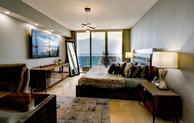 a living room with furniture fireplace and a flat screen tv