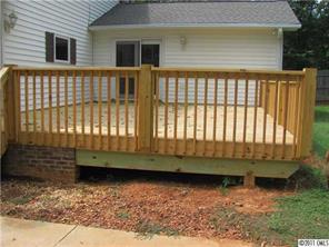 8267 Normandy Road Denver, NC 28037 - Photo 15 of 16 a view of a house with a yard