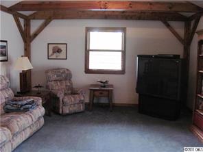 8267 Normandy Road Denver, NC 28037 - Photo 9 of 16 a living room with furniture and a window