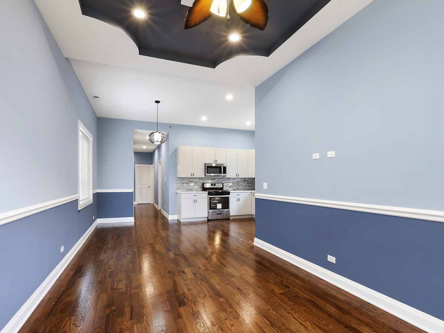 5939 West Superior Street, Unit 1 Chicago, IL 60644 - Photo 4 of 12 a view of kitchen with stove and cabinets