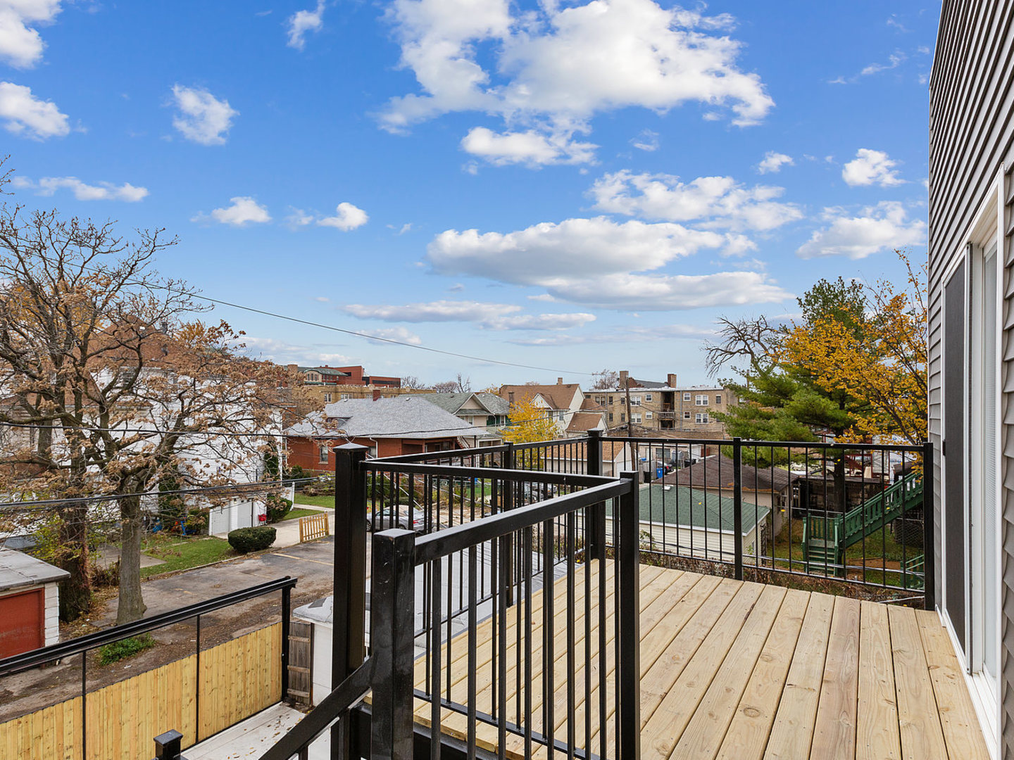 5939 West Superior Street, Unit 1 Chicago, IL 60644 - Photo 10 of 12 a view of city from a balcony