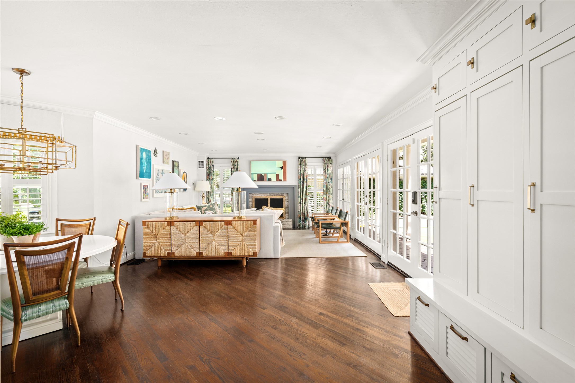 3784 Ingold Street Houston, TX 77005 - Photo 19 of 50 Family area with additional area at left as a breakfast room. Stunning natural light through French doors at right that lead to the backyard.