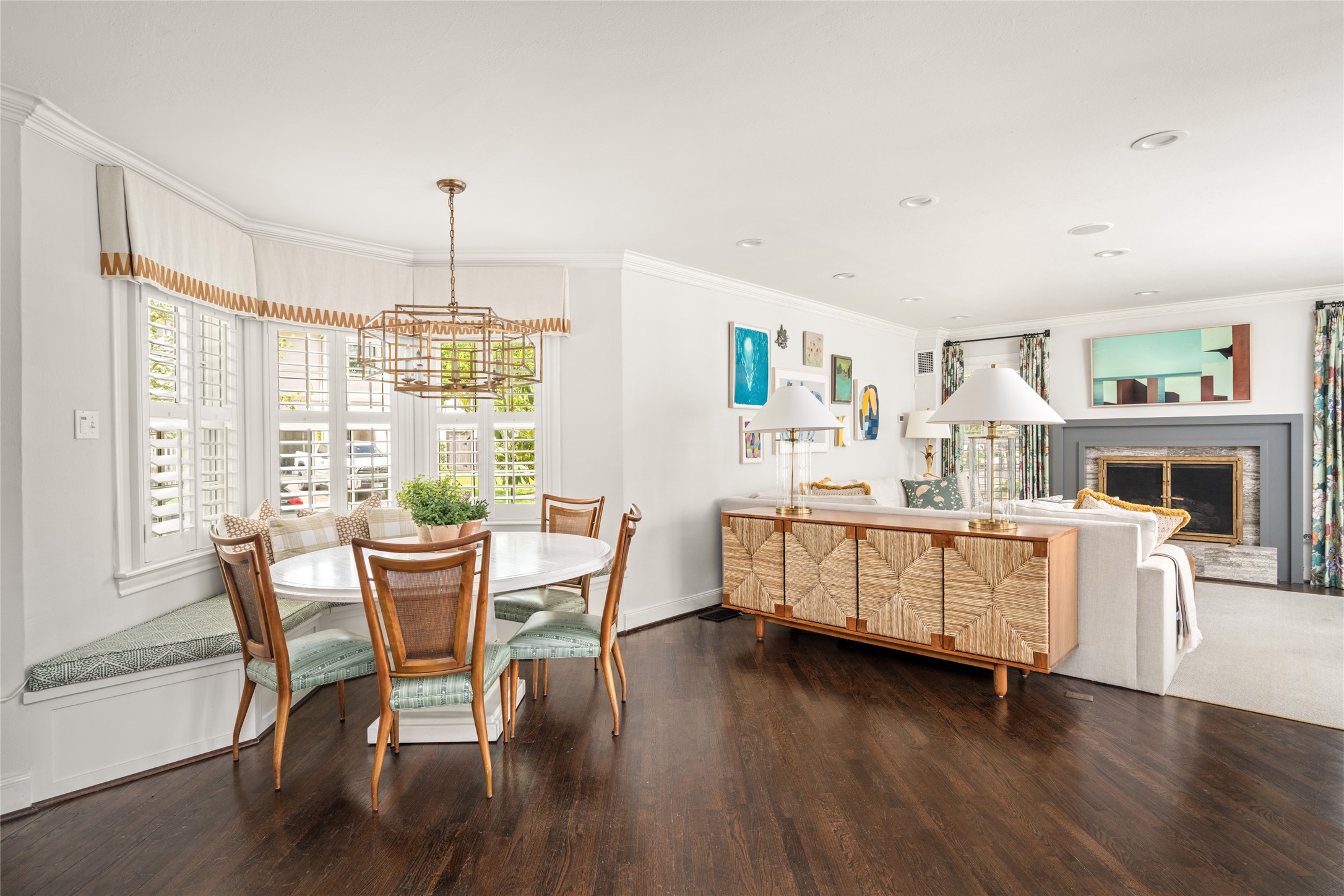 3784 Ingold Street Houston, TX 77005 - Photo 20 of 50 Breakfast area with adorable banquet, custom shutters and valances and chandelier.