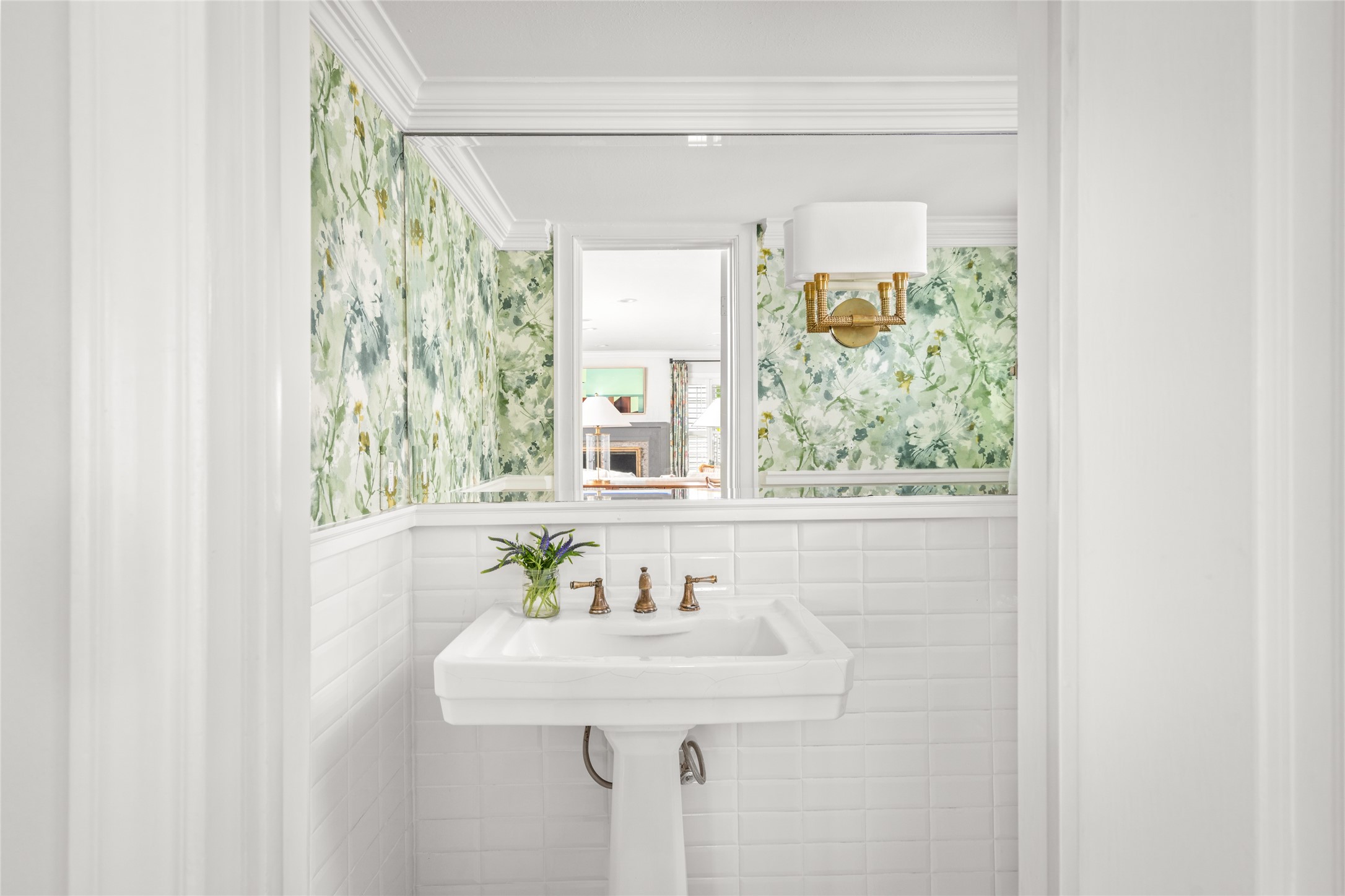 3784 Ingold Street Houston, TX 77005 - Photo 28 of 50 First floor powder room off the family room with a touch of wallpaper and pedestal sink.