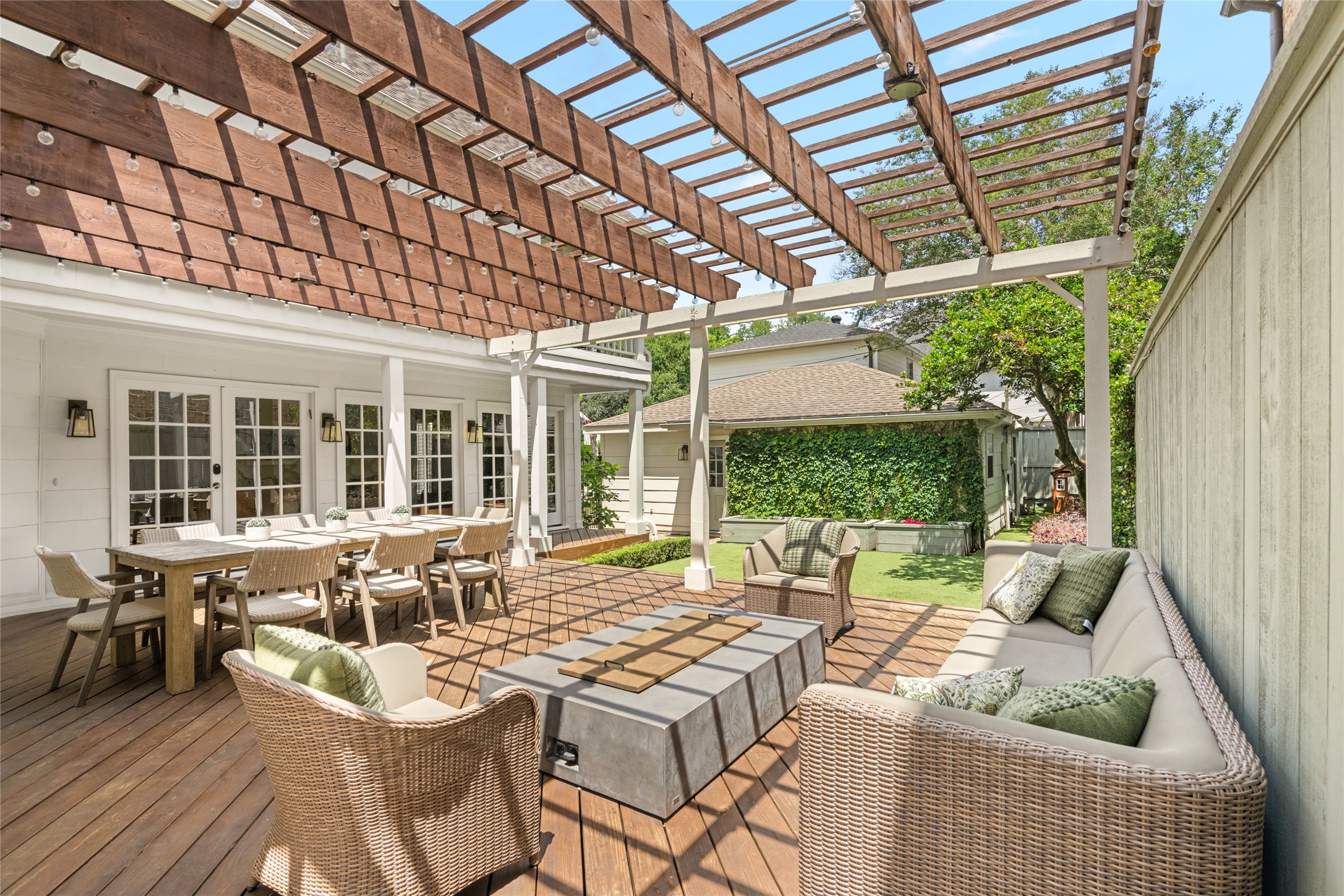 3784 Ingold Street Houston, TX 77005 - Photo 46 of 50 Deck space is expansive with room for a dining table as well as sofas and chairs, perfect for entertaining!