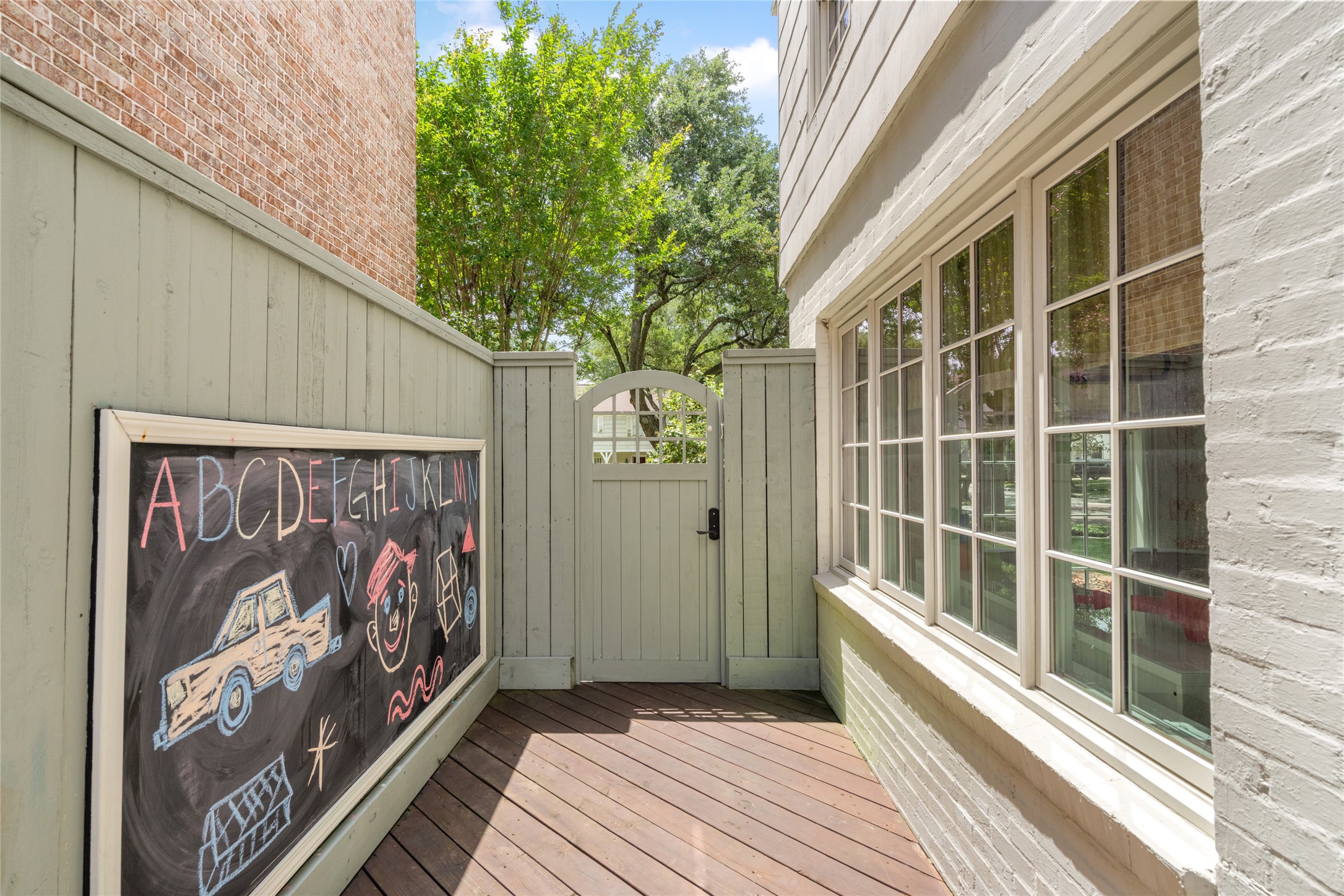 3784 Ingold Street Houston, TX 77005 - Photo 47 of 50 Side yard is also decked and gated.