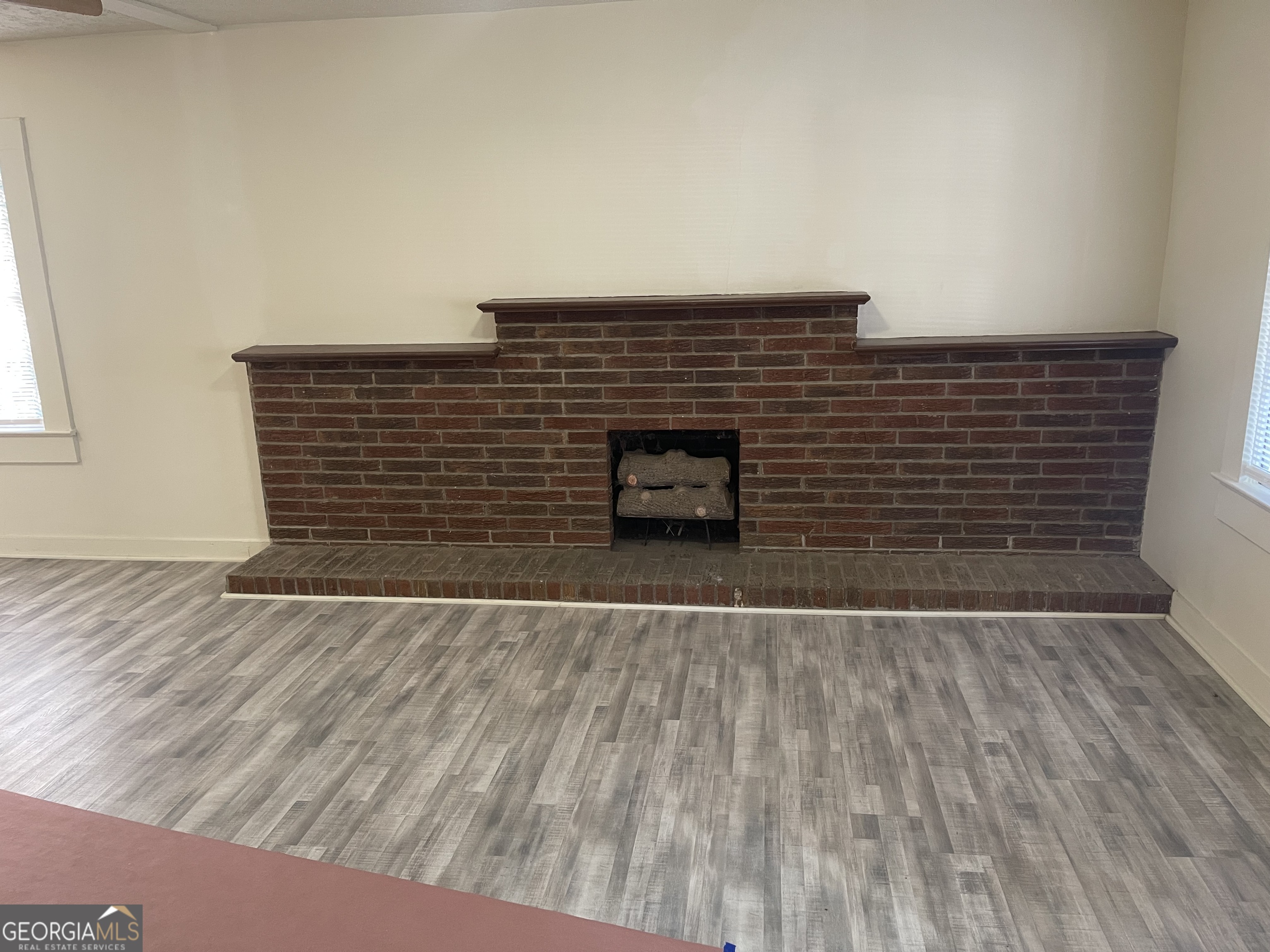 478 South Pond Street Toccoa, GA 30577 - Photo 15 of 46 a view of an empty room and wooden floor