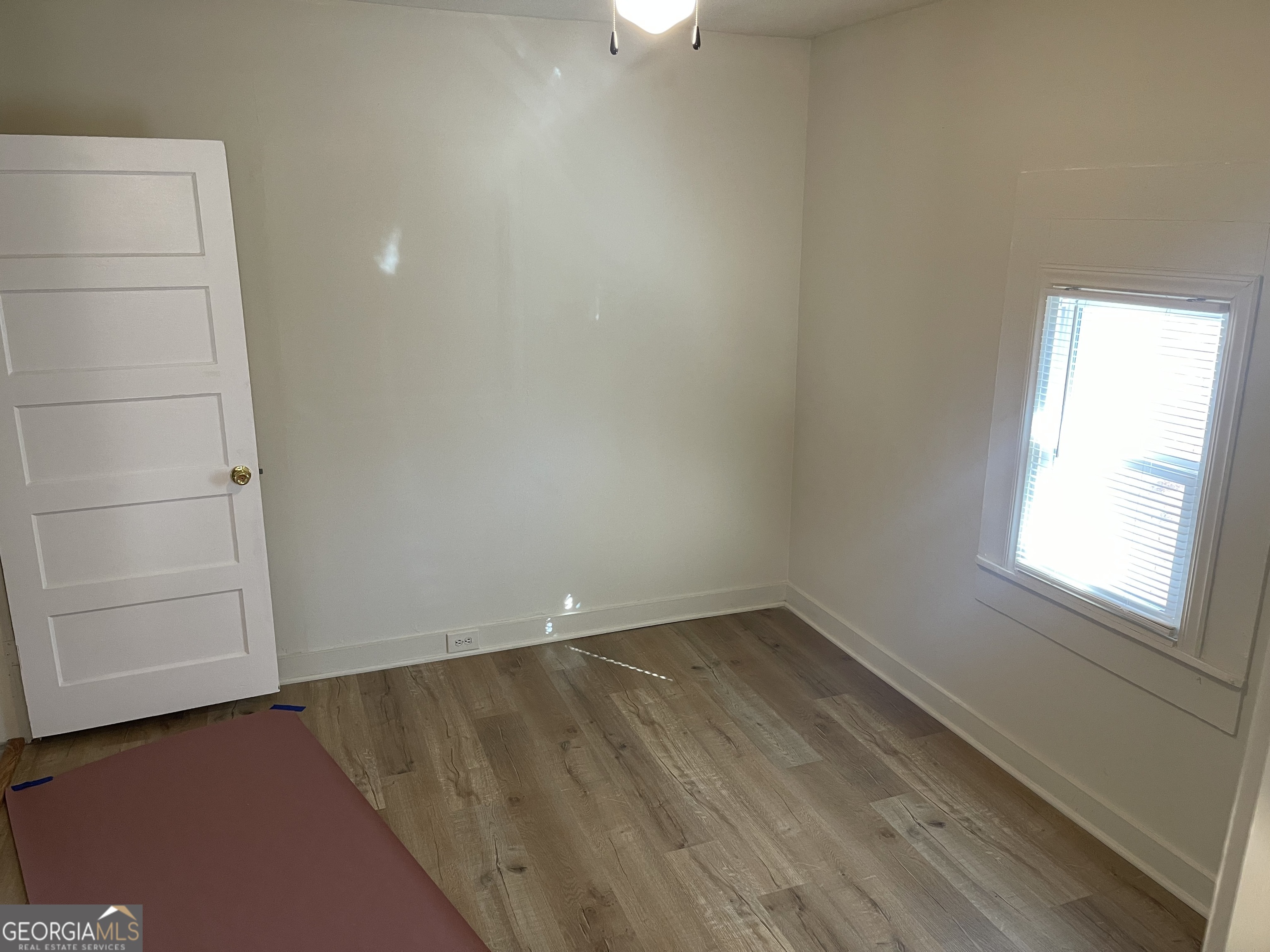 478 South Pond Street Toccoa, GA 30577 - Photo 22 of 46 an empty room with a empty space and window