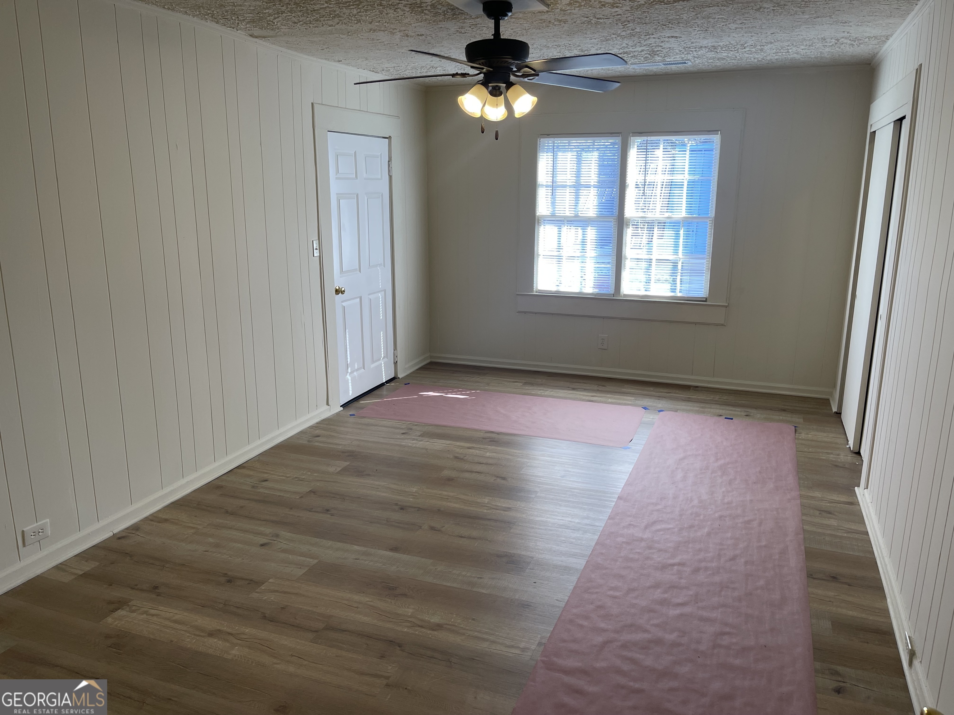 478 South Pond Street Toccoa, GA 30577 - Photo 23 of 46 wooden floor in an empty room with a window