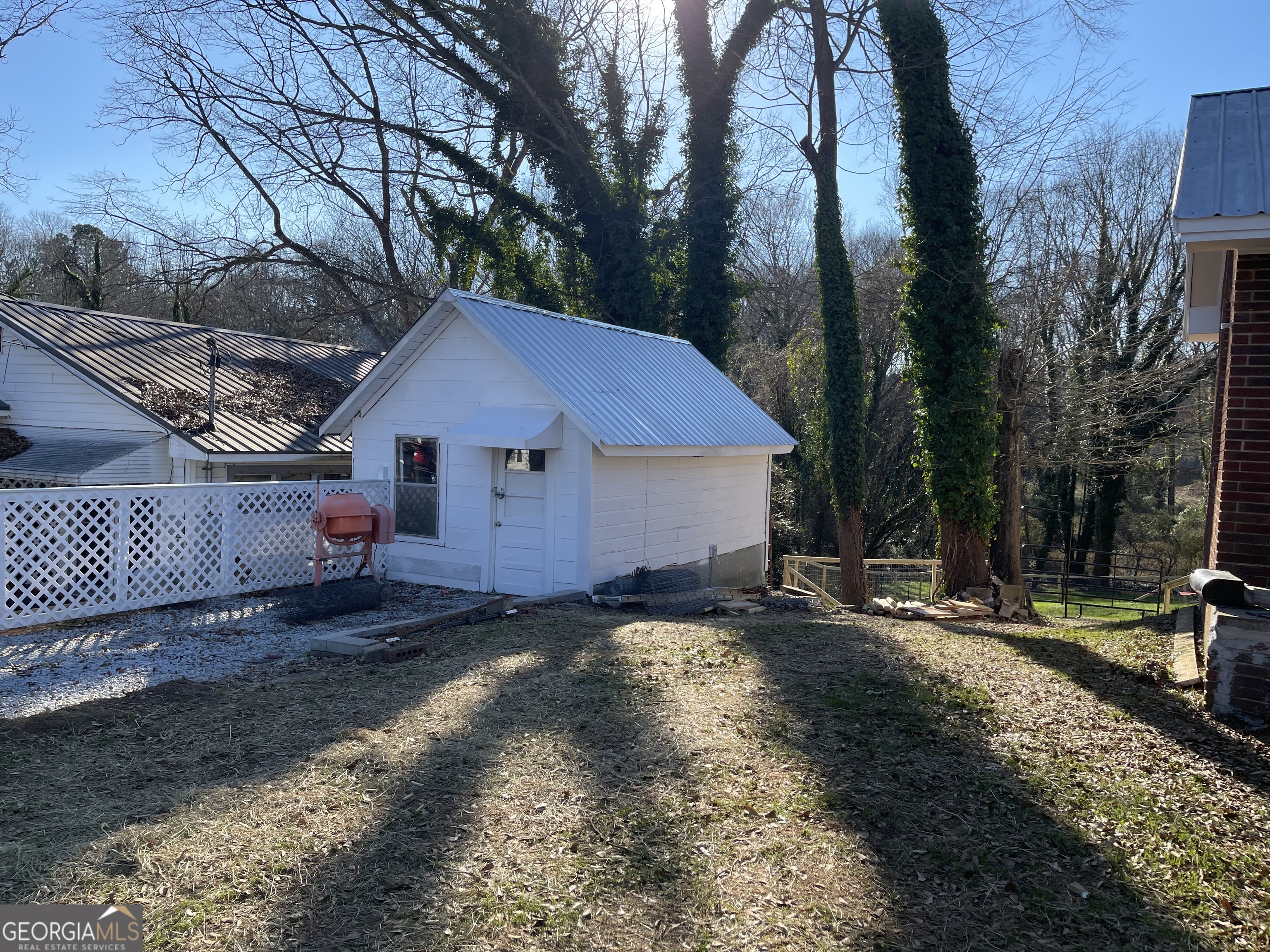 478 South Pond Street Toccoa, GA 30577 - Photo 42 of 46 a view of a house with a yard covered with snow in the background