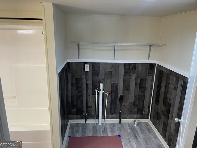 a view of a walk in closet