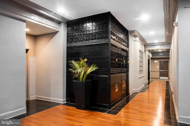 a kitchen with stainless steel appliances granite countertop a refrigerator and a stove