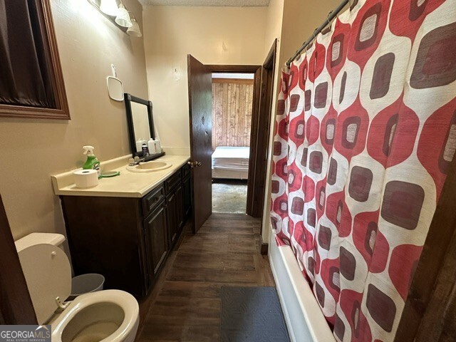 308 Three Rivers Lane Uvalda, GA 30473 - Photo 10 of 28 a bathroom with a sink and mirror with toilet