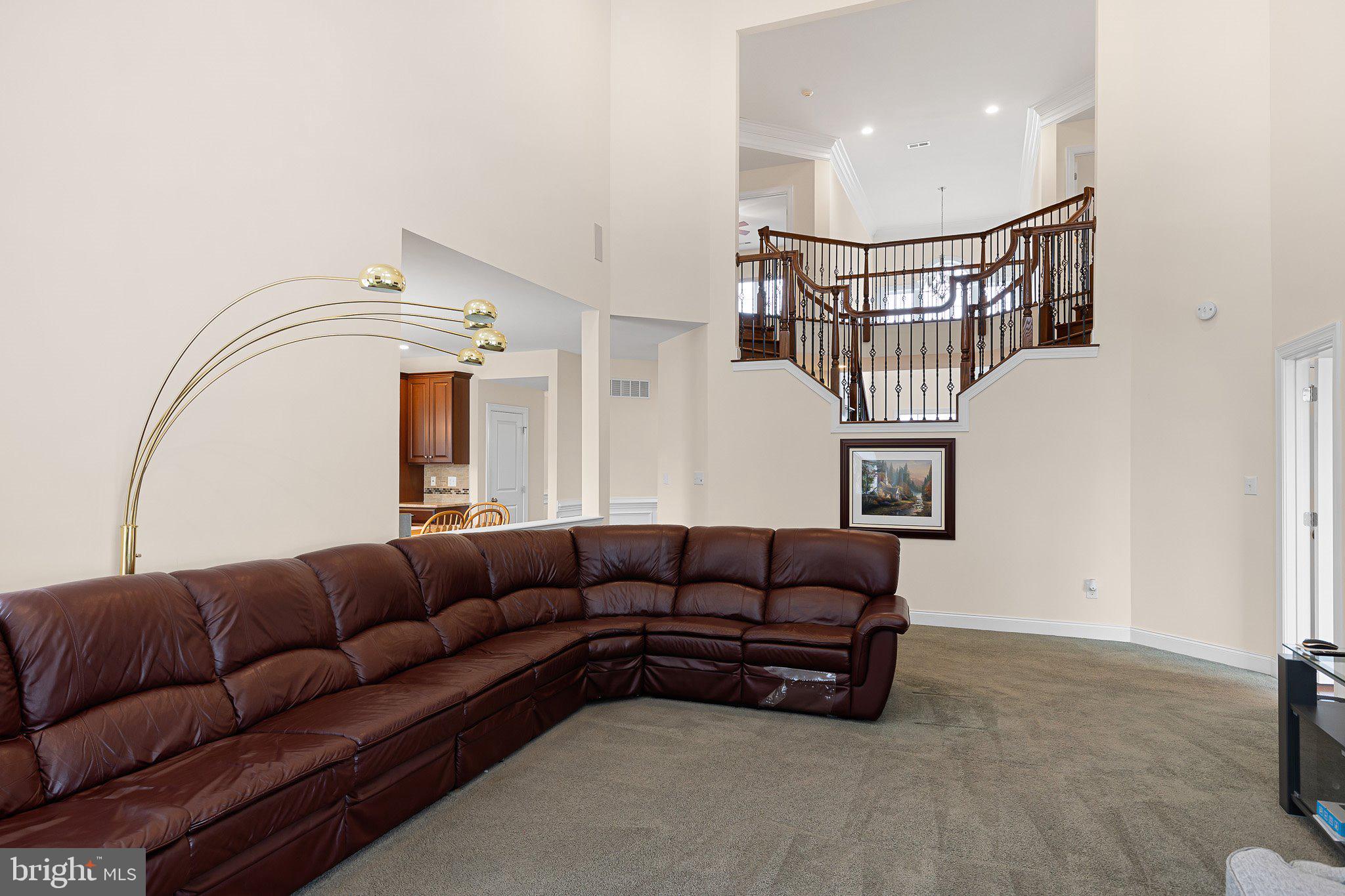 1020 Matthew Way New Castle, DE 19720 - Photo 19 of 55 a living room with furniture a rug and white walls