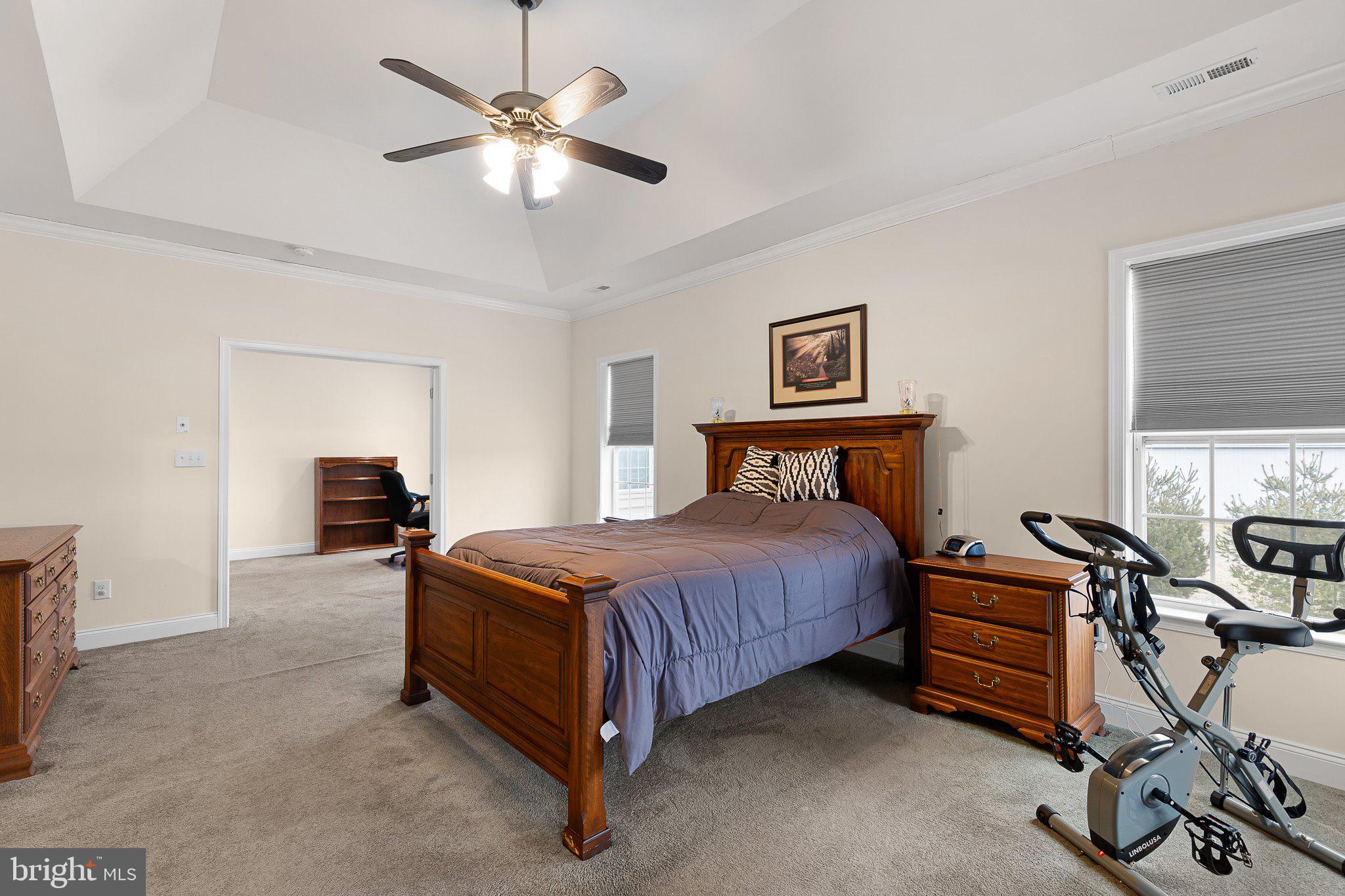 1020 Matthew Way New Castle, DE 19720 - Photo 24 of 55 a bedroom with a bed and a chandelier