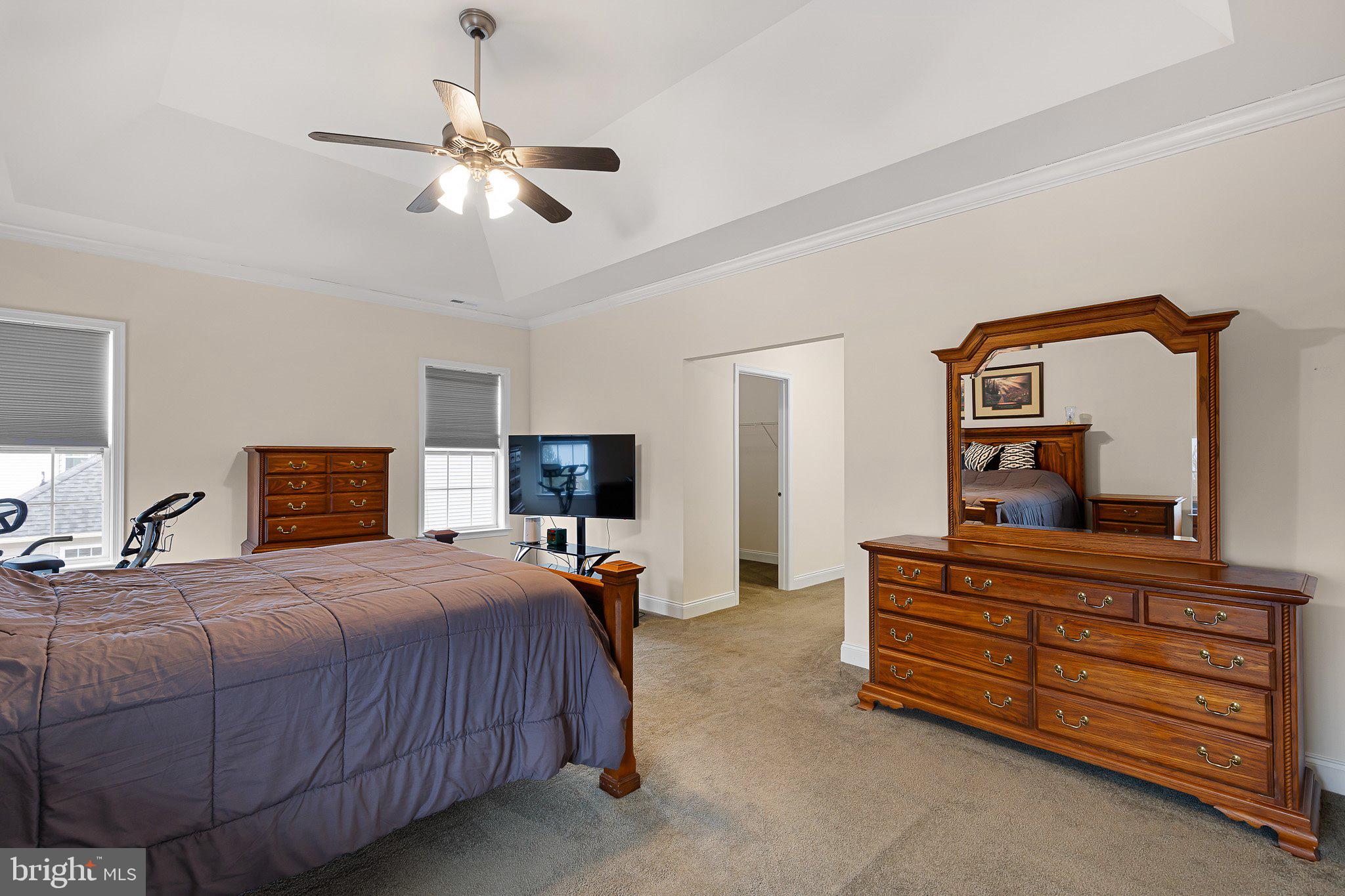 1020 Matthew Way New Castle, DE 19720 - Photo 25 of 55 a bedroom with a bed and a chandelier