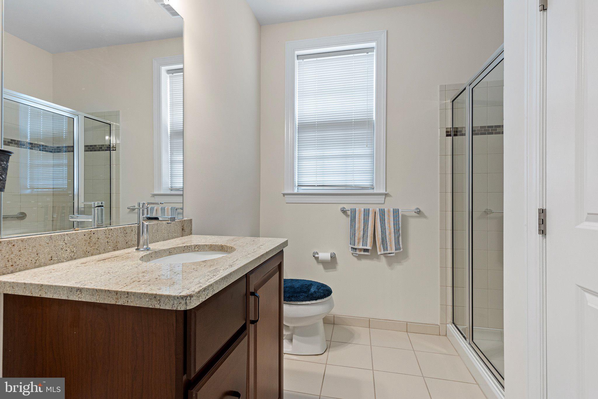 1020 Matthew Way New Castle, DE 19720 - Photo 37 of 55 a bathroom with a sink a toilet and shower