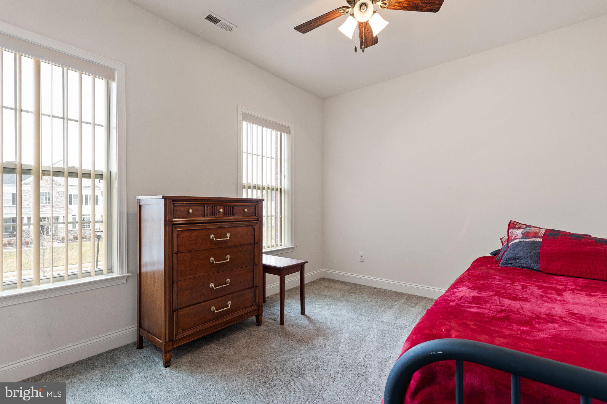 1020 Matthew Way New Castle, DE 19720 - Photo 38 of 55 a bedroom with a bed and a dresser