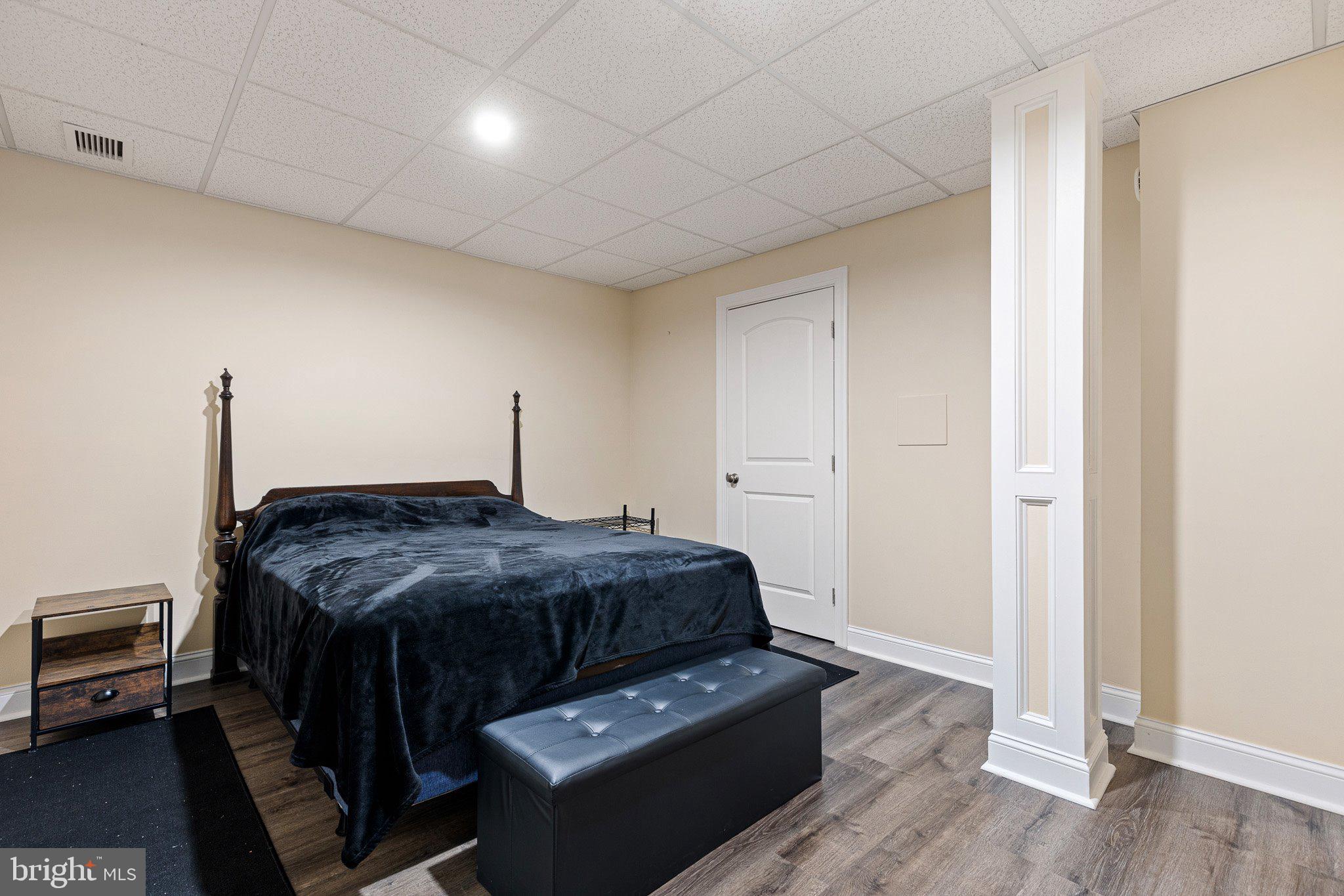 1020 Matthew Way New Castle, DE 19720 - Photo 44 of 55 a bedroom with furniture and wooden floor