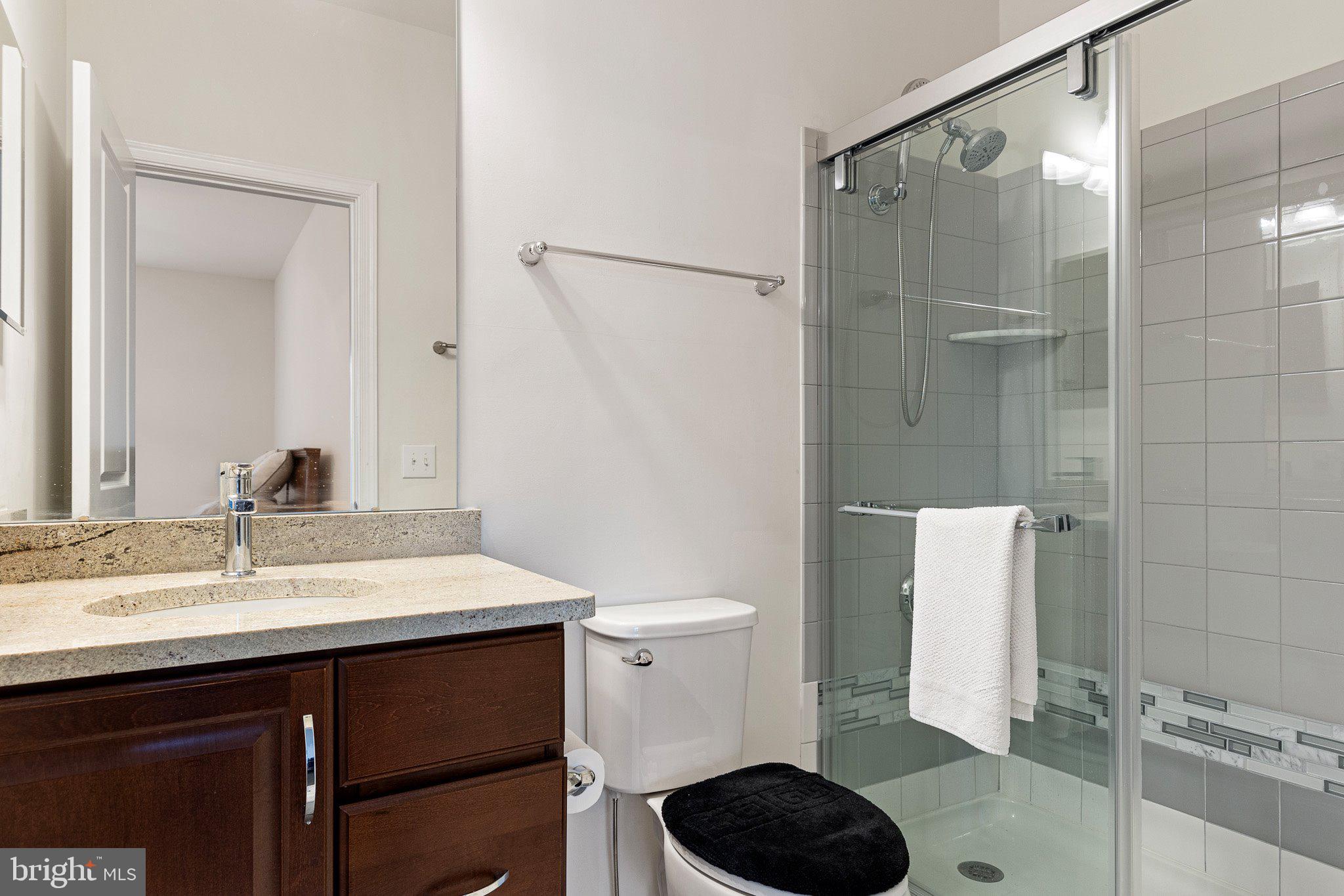1020 Matthew Way New Castle, DE 19720 - Photo 45 of 55 a bathroom with a sink a toilet and shower