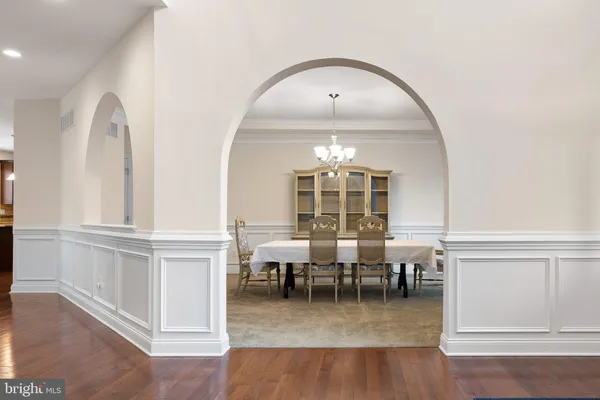 a view of a livingroom with furniture and wooden floor