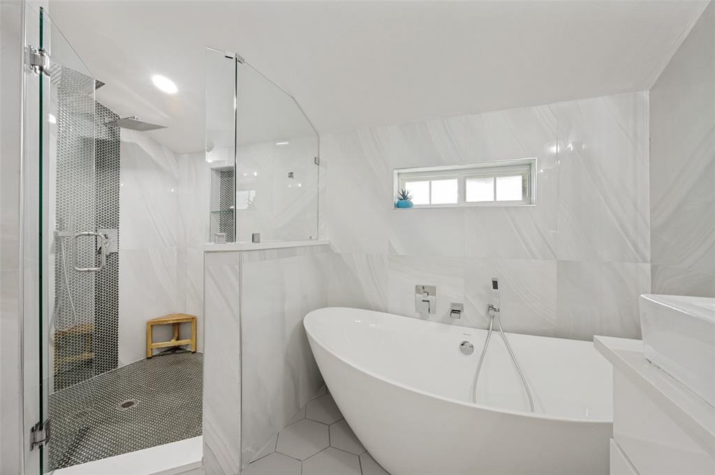 3619 Merrell Road Dallas, TX 75229 - Photo 23 of 26 Freestanding soaking tub with floor-mounted faucet and handheld shower sprayer
