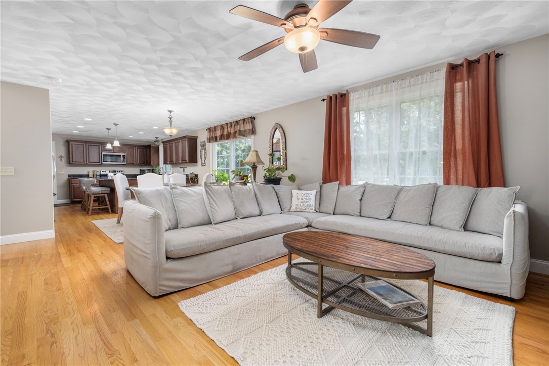 321 River Road Lincoln, RI 02865 - Photo 12 of 45 Another perspective of the living room shows its great size.