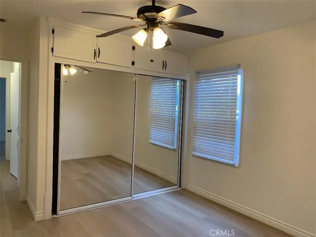 a bathroom with a sink a mirror and vanity