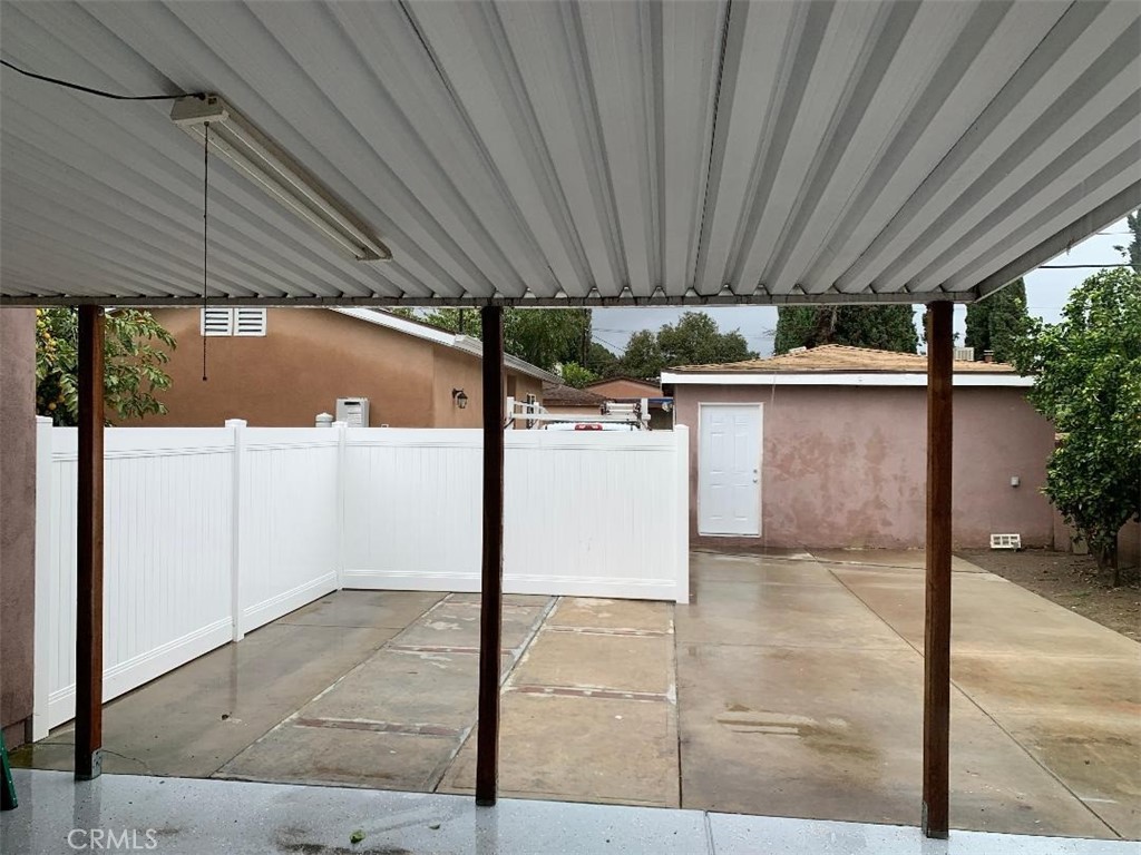 18233 Welby Way Reseda, CA 91335 - Photo 14 of 15 a view of a garage