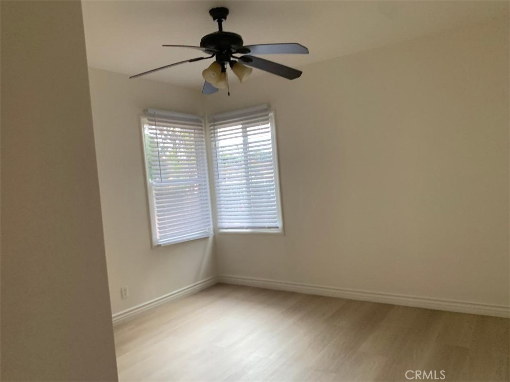 18233 Welby Way Reseda, CA 91335 - Photo 7 of 15 a view of an empty room with a window