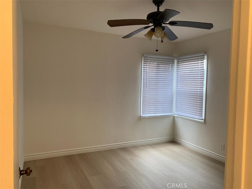 18233 Welby Way Reseda, CA 91335 - Photo 9 of 15 a view of an empty room with a window