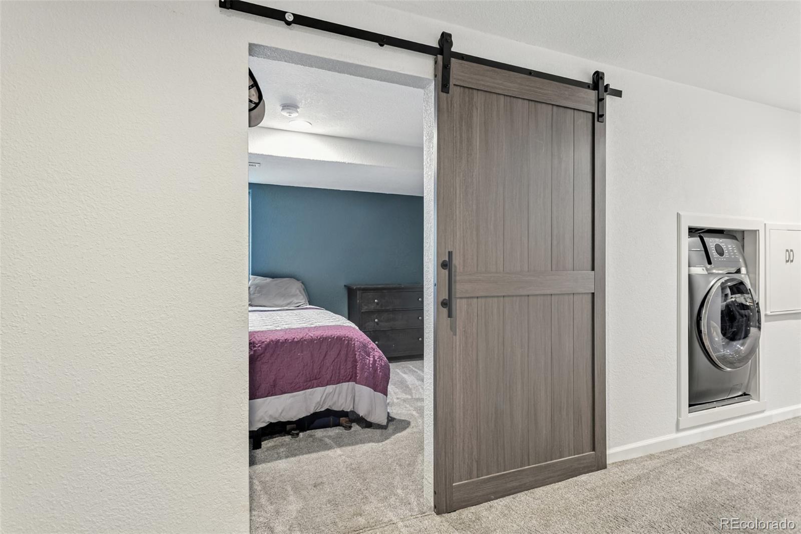 334 Octillo Street Brighton, CO 80601 - Photo 25 of 39 a utility room with a washer and dryer