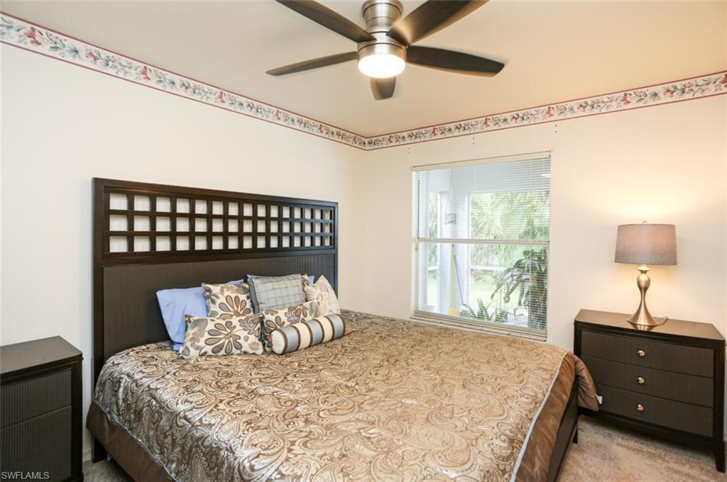 7775 Scarlet Court Naples, FL 34104 - Photo 23 of 30 Bedroom featuring ceiling fan