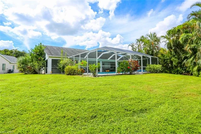 a view of a house with a big yard