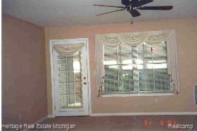 1133 Curzon Court, Unit 85 Howell, MI 48843 - Photo 2 of 3 Living Room