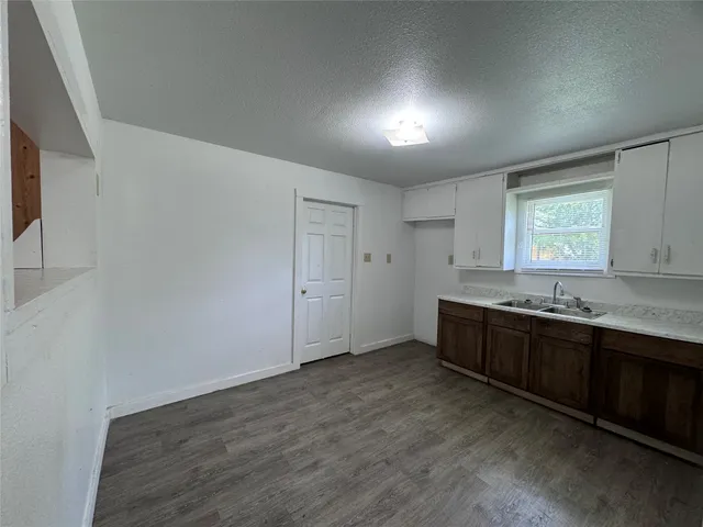 a room with a sink and a window