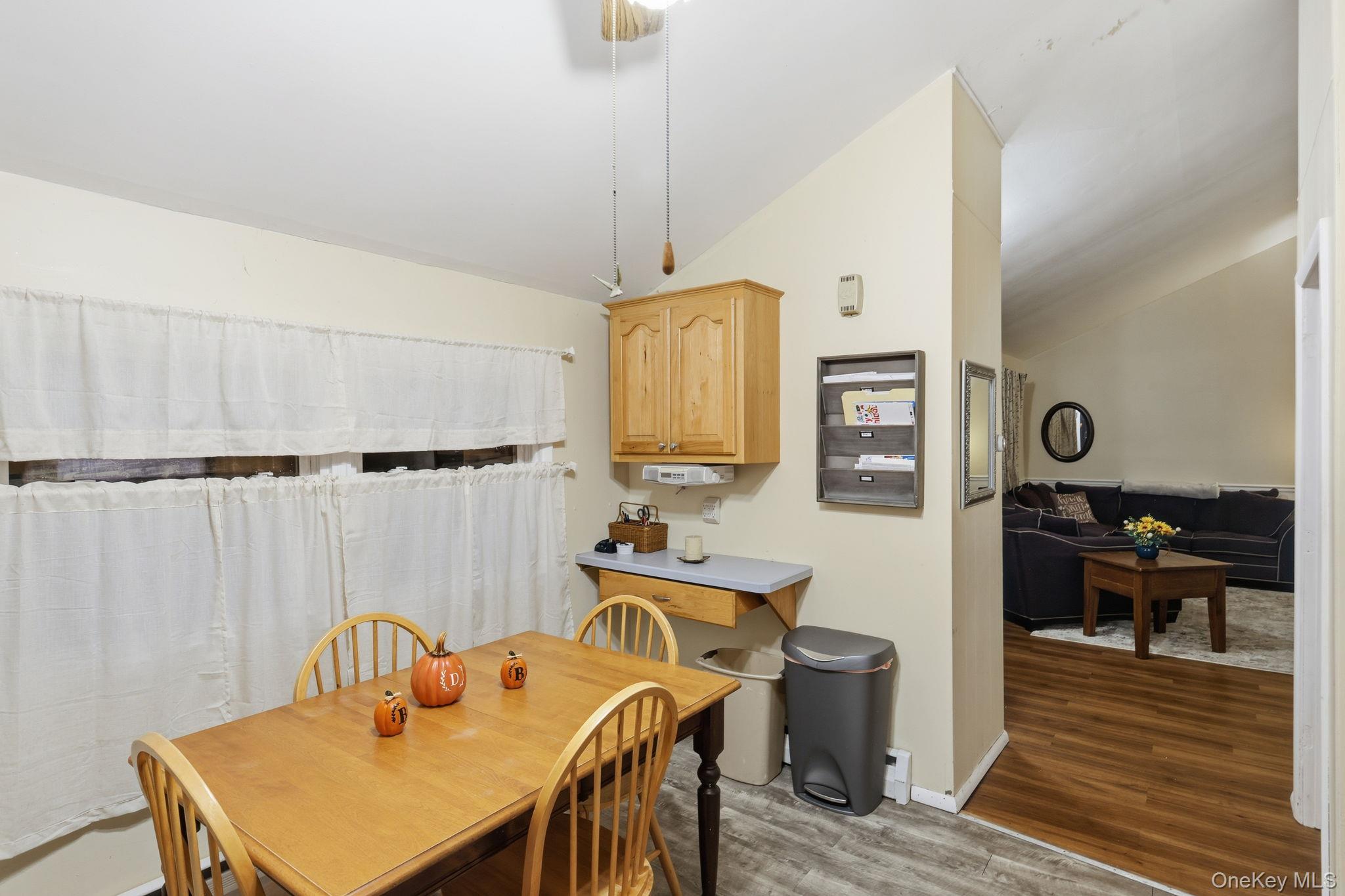 6 Liss Road Wappingers Falls, NY 12590 - Photo 11 of 28 a view of a dining room with furniture and wooden floor