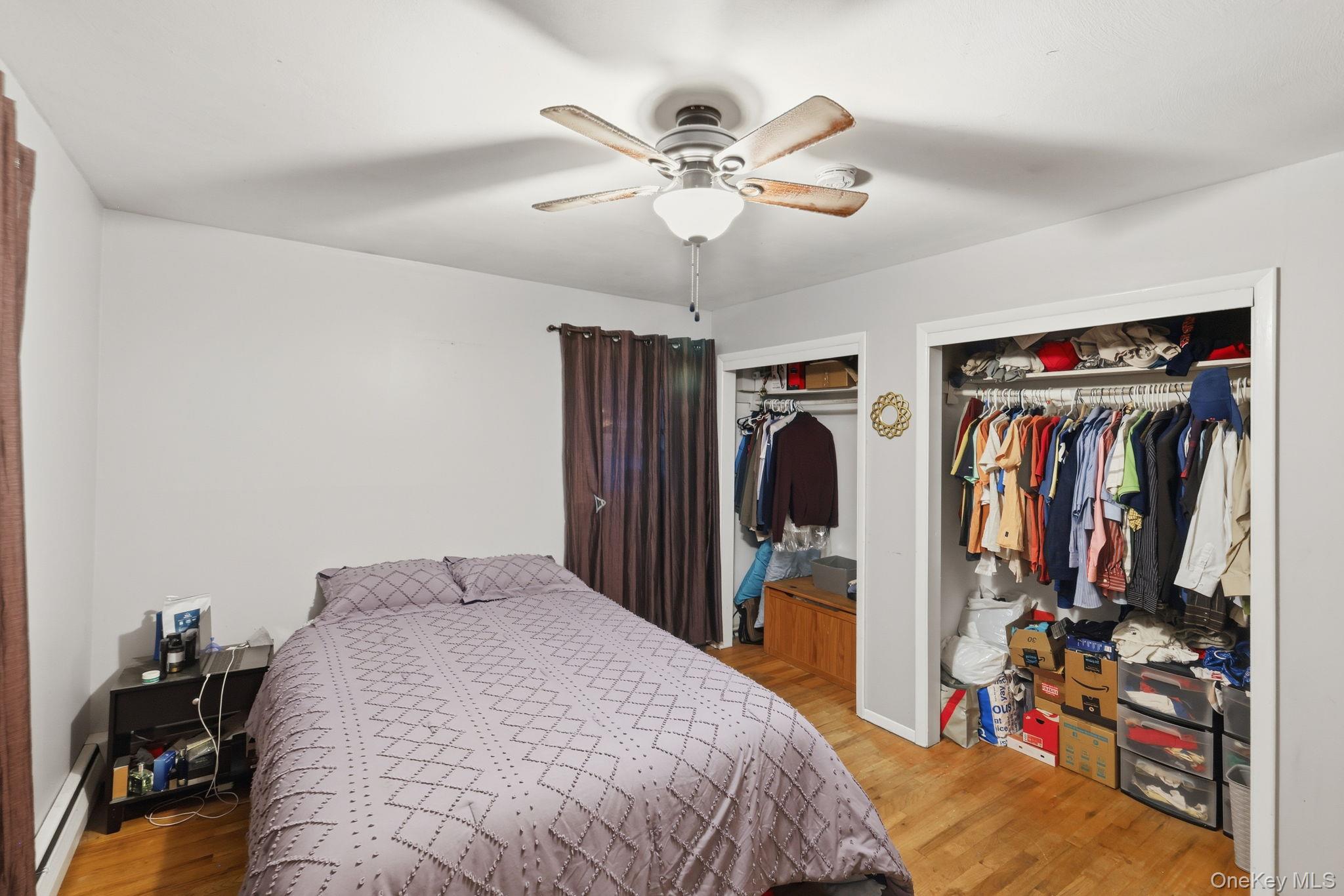 6 Liss Road Wappingers Falls, NY 12590 - Photo 16 of 28 a bed room with a bed and a walk in closet