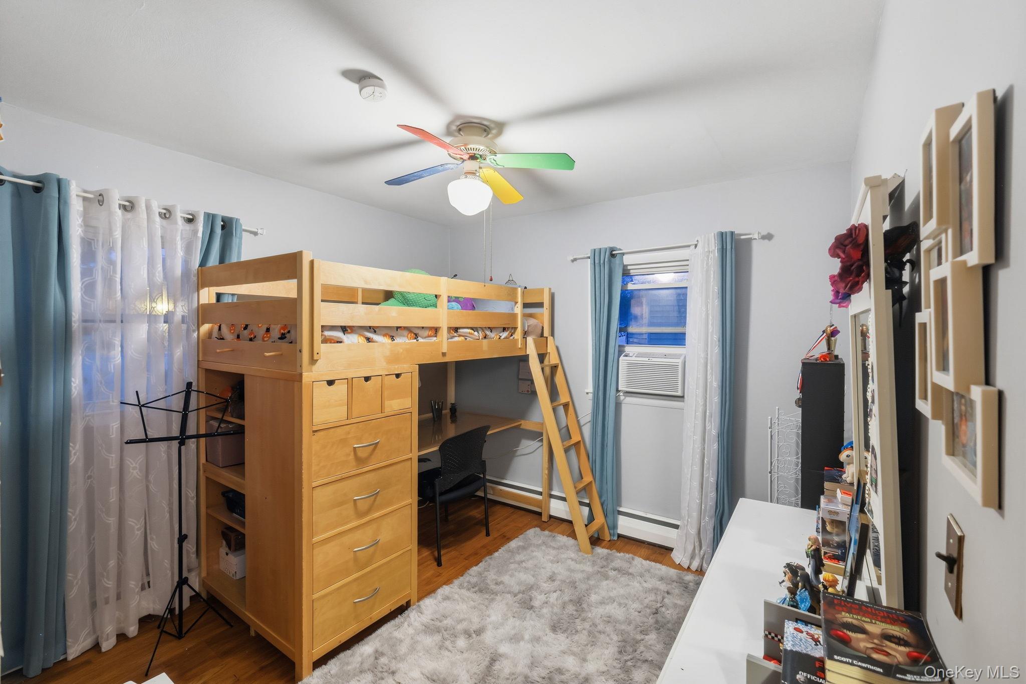 6 Liss Road Wappingers Falls, NY 12590 - Photo 19 of 28 a bedroom with a bed and a flat tv screen