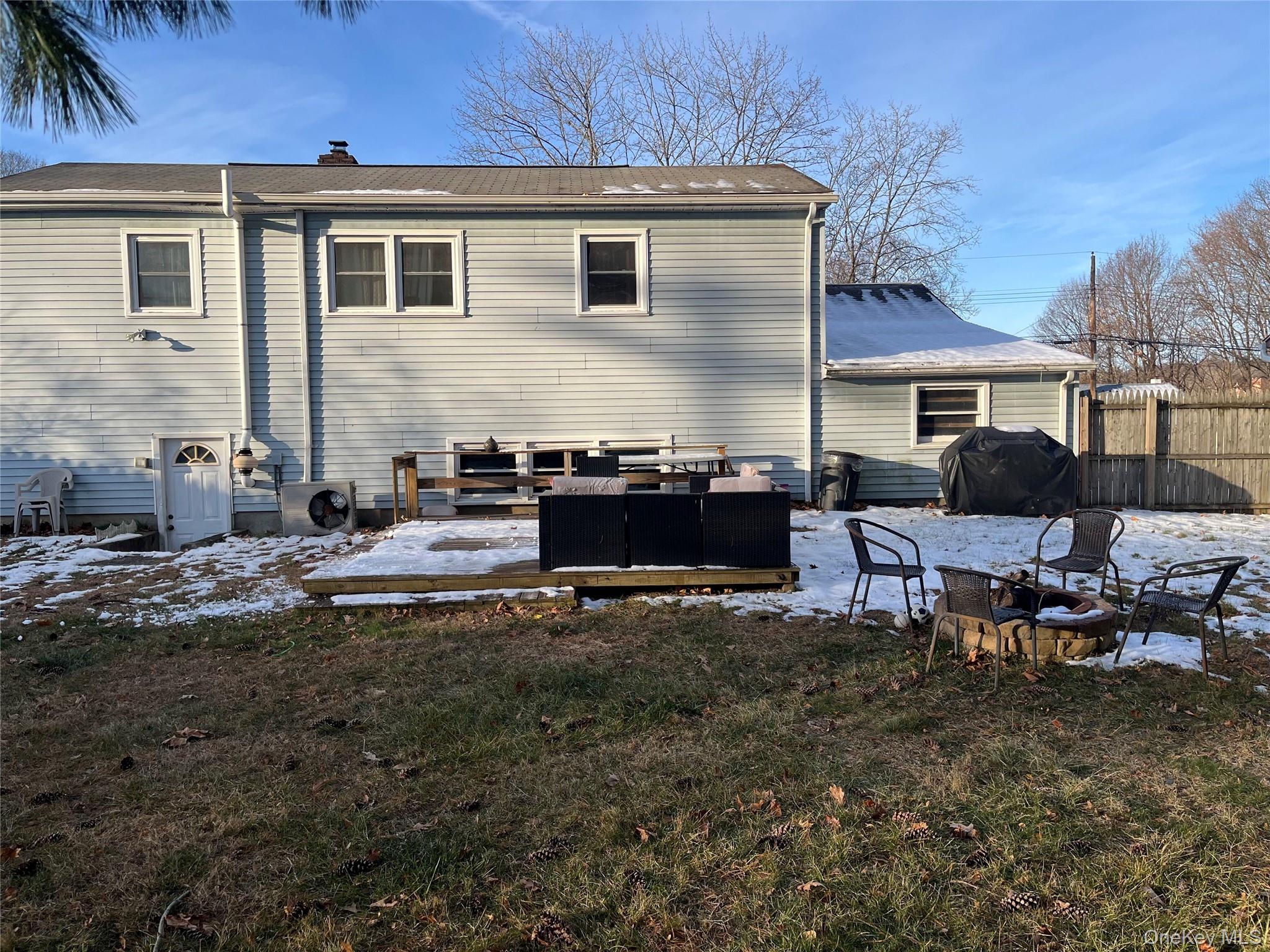6 Liss Road Wappingers Falls, NY 12590 - Photo 27 of 28 a backyard of a house with fire pit barbeque oven and outdoor seating