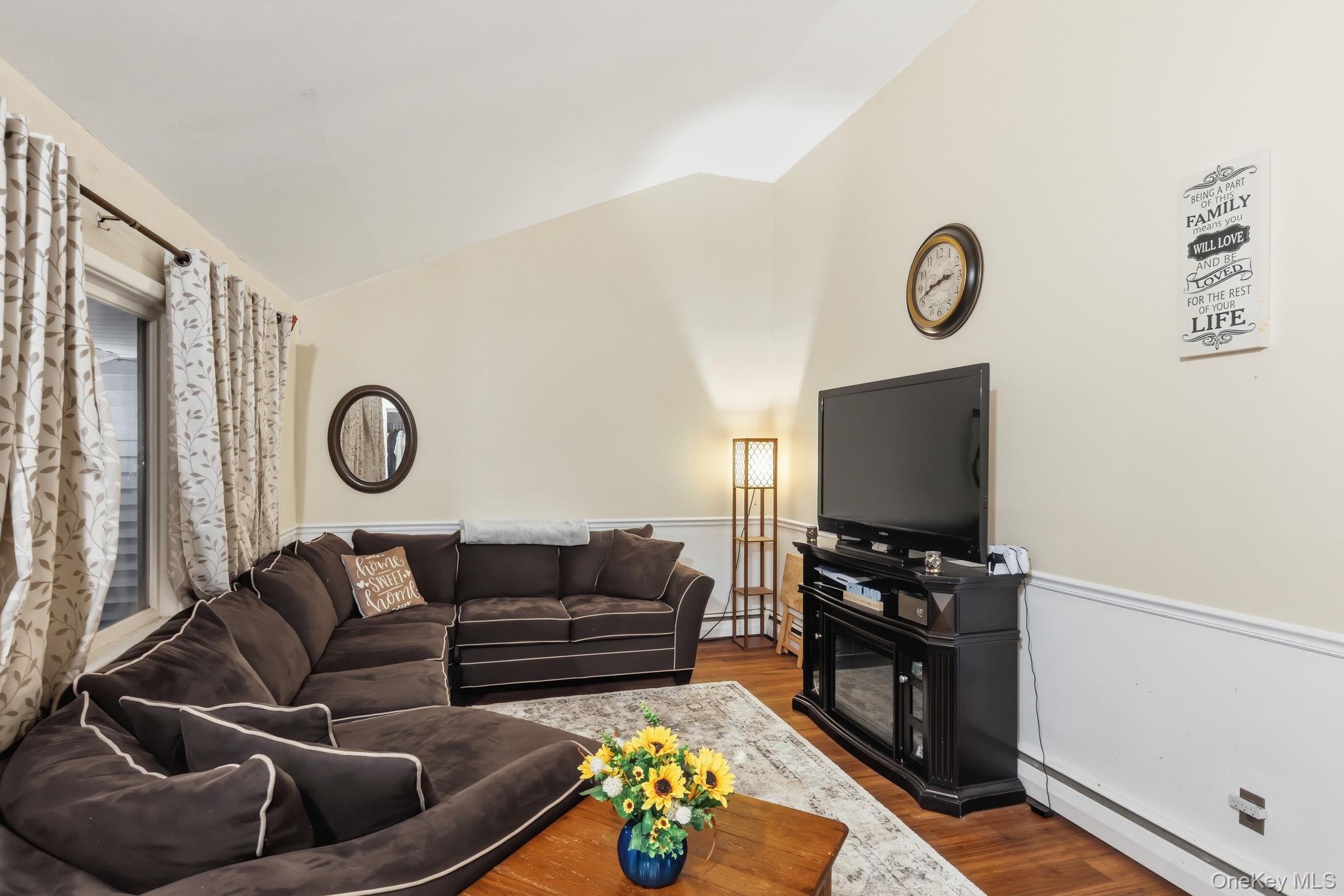 6 Liss Road Wappingers Falls, NY 12590 - Photo 6 of 28 a living room with furniture and a flat screen tv