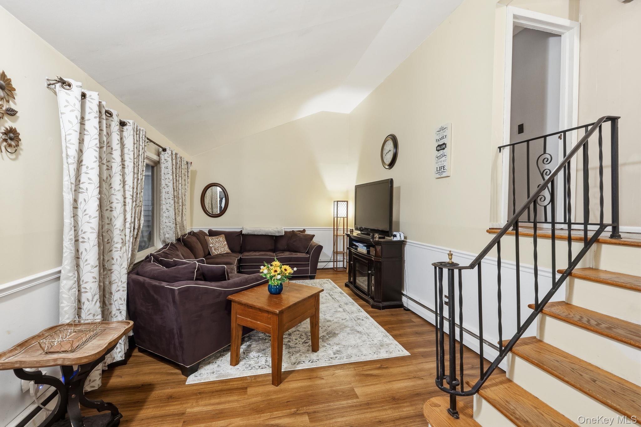 6 Liss Road Wappingers Falls, NY 12590 - Photo 7 of 28 a living room with furniture and a flat screen tv